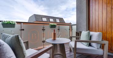 Brooks Hotel | D02 TV06 | Summer Sale | balcony room at brooks hotel overlooking drury street with a bottle of prosecco